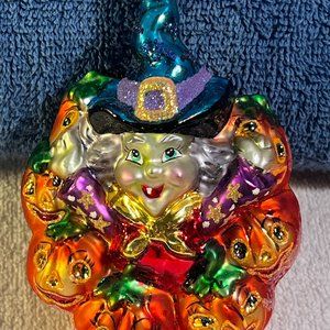 Radko Halloween ornament glass witch head surrounded by pumpkins cackles & boos